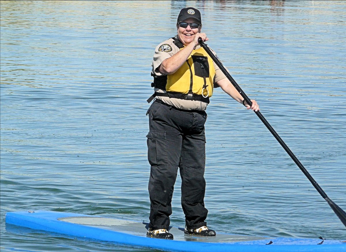 PICT Park Ranger Darcy Mount on paddleboard - CPW PICT Park Ranger Darcy Mount on paddleboard - CPW