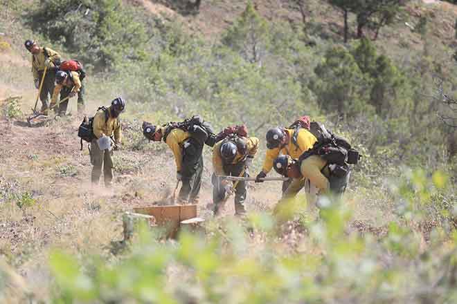 PICT Firefighters building line to help contain the Grizzly Creek Fire