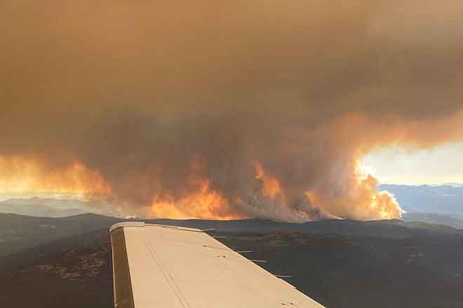 PICT Smoke and flames from the Cameron Peak Fire as seen from the air