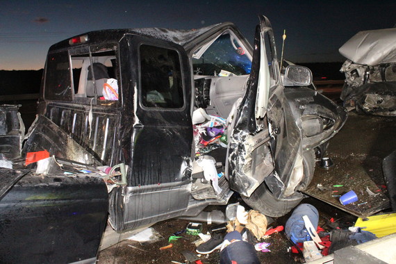 PICT Heavily damaged truck involved in a crash which also destroyed a Colorado State Patrol motorcycle - CSP