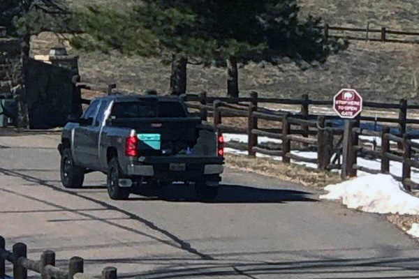 Suspect pickup on a roadway facing away from the camera.