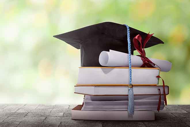 PROMO Education - Graduation Cap Diploma Books - iStock - leolintang