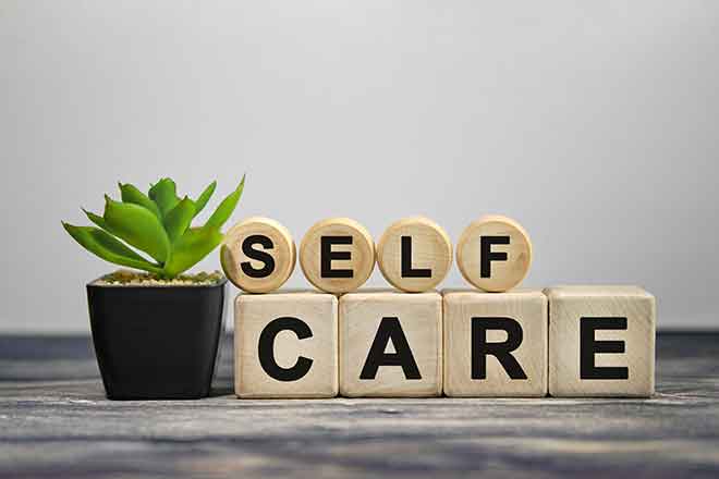 PROMO Health - Self Care Words Blocks Mental Behavioral - iStock - Aksana Kavaleuskaya