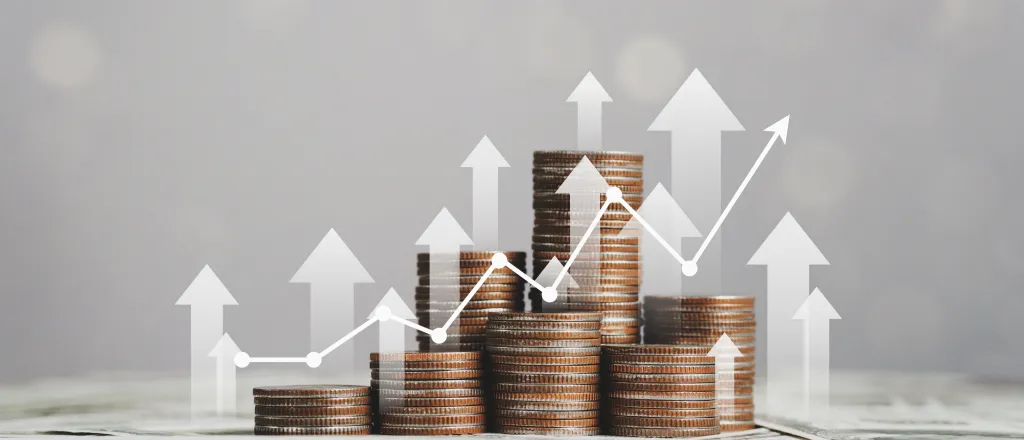 Stacks of varying amounts of coins with arrows pointing up and a graph line trending up