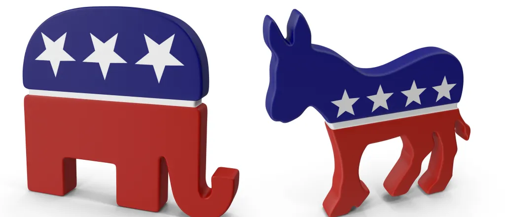 Democrat and Republican Party symbols of an elephant and donkey in a patriotic red, white, and blue motif - fitimi - iStock-528483210