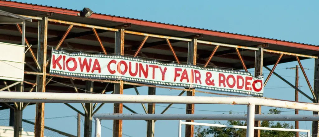 Grandstands at the Kiowa County Fairground with a banner reading "Kiowa County Fair & Rodeo"