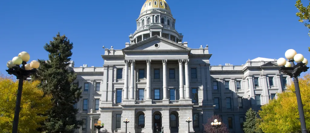 View of the Colorado state capitol building in the early autumn