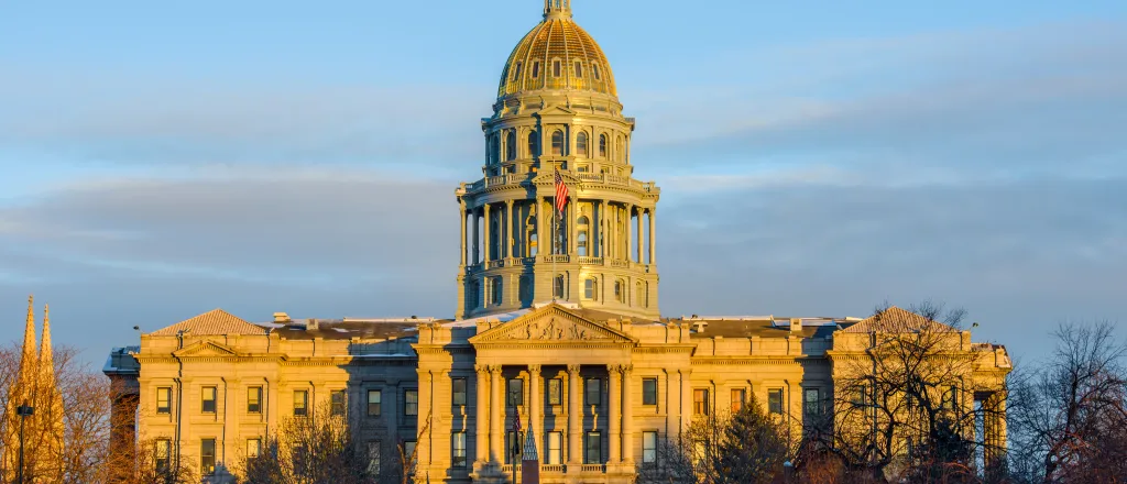 View of the Colorado state capitol building at sunrise in winter