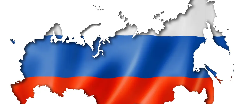 Russian flag showing through an overlaying cutout of the country