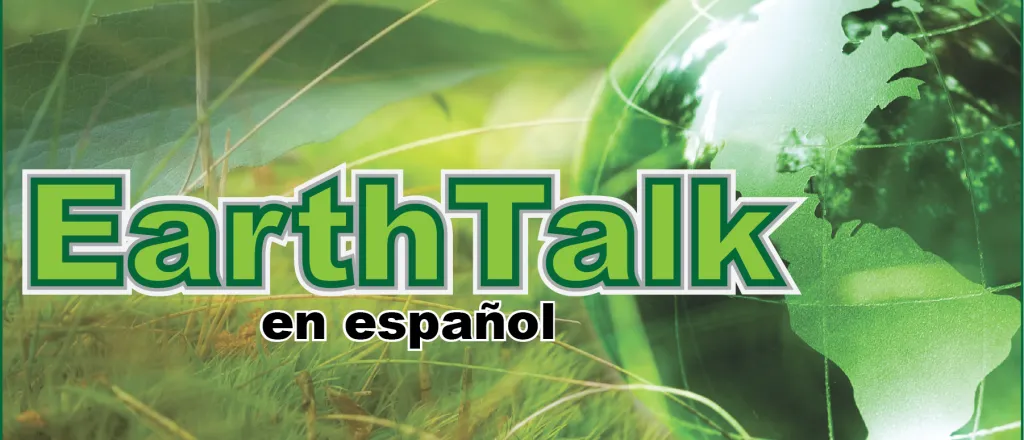 Title card for the EarthTalk en espanol environmental column showing a green glass globe.