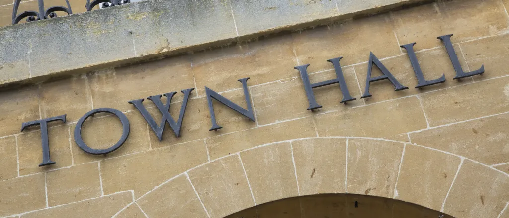 PROMO HIRES Building - Government Town Hall Sign - iStock - KevinAlexanderGeorge Building with the words "Town Hall"