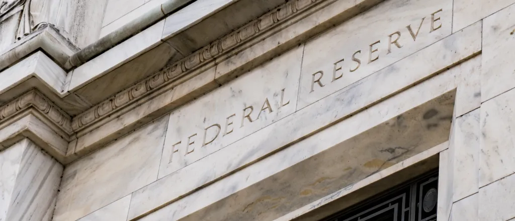 PROMO HIRES Finance - Goverment Bank Federal Reserve Building - iStock pabradyphoto Stone building with the words "Federal Reserve" over a doorway