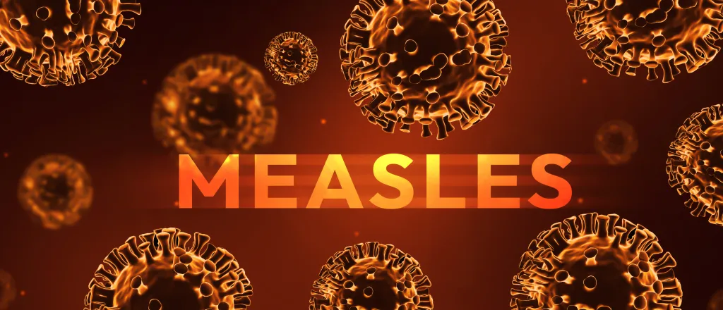 PROMO HIRES CROPPED Health - Measles Virus - Muhammad Farhad - iStock-2202501869 Concept artwork of viruses with the word "Measles."