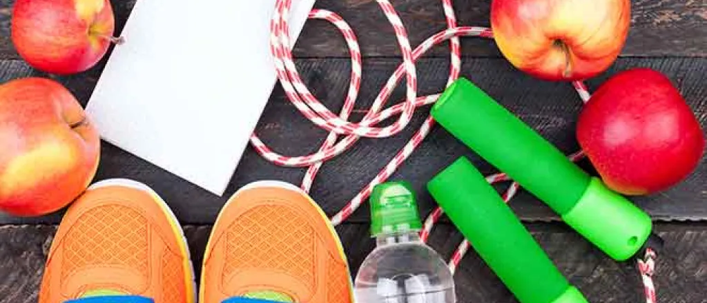 Health - Fitness Shoes Water Bottle Apple Jump Rope Note Pad - iStock - LanaSweet 