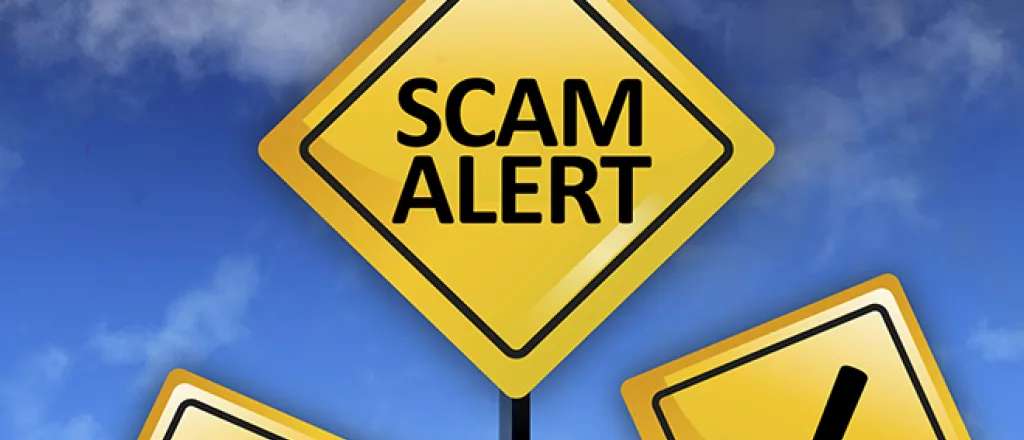 PROMO 660 x 440 Tips - Scam Alert Caution Sign - iStock