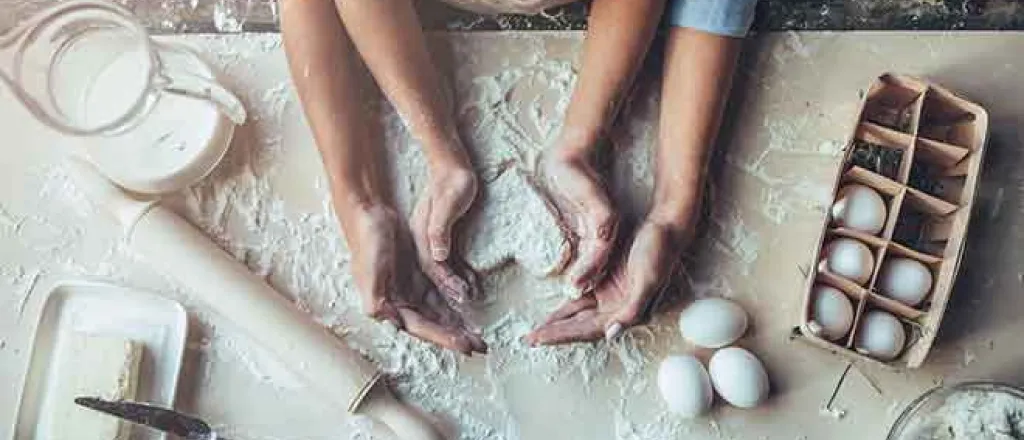 PROMO Food - Cooking Baking Hands Eggs Flour Butter Milk Rolling Pin - iStock - Vasyl Dolmatov