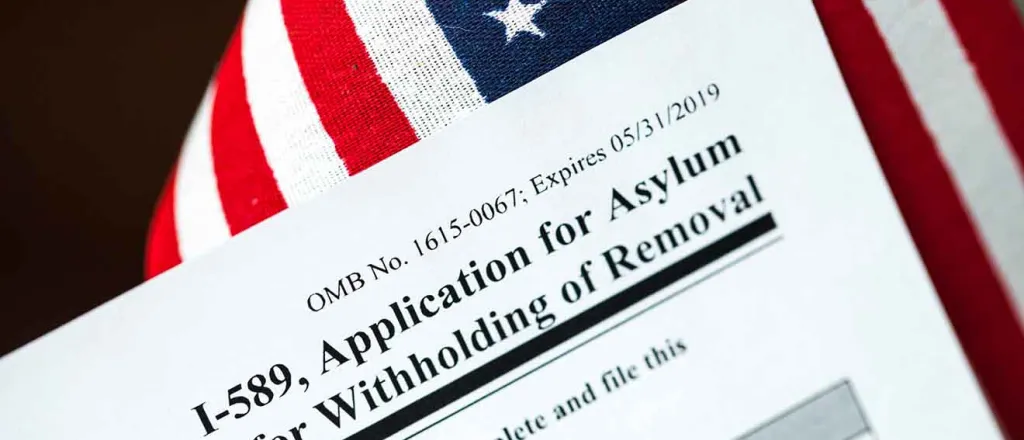 PROMO Miscellaneous - I-589 Application for Asylum Migrant Immigration - iStock - Eblis