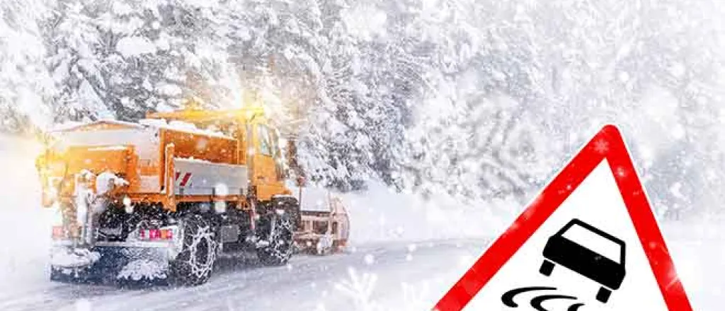 PROMO 64J1 Weather - Snow Snowplow Driving Icy Slick Road Danger Ice - iStock - auerimages