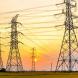 PROMO 64J1 Energy - Power Lines Sky Sunset Clouds High Voltages - iStock - zhaojiankang