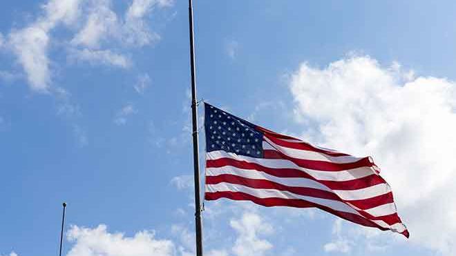 Flags lowered to honor the victims of the Robb Elementary School shooting