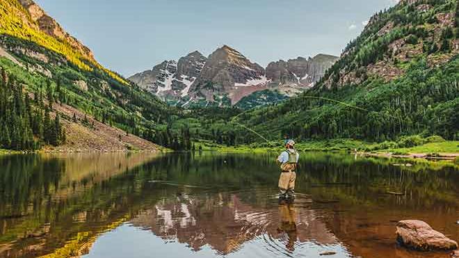 PROMO 64J1 Outdoors - Fishing Fisherman Aspen Maroon Bells Mountains Water Trees - iStock - Matt Dirksen PROMO Outdoors - Fishing Fisherman Aspen Maroon Bells Mountains Water Trees - iStock - Matt Dirksen