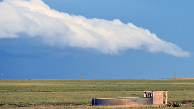 PROMO 64S Agriculture - Stock Tank Field Clouds Prairie Cheyenne County Colorado - Chris Sorensen PROMO 64S Agriculture - Stock Tank Field Clouds Prairie Cheyenne County Colorado - Chris Sorensen