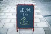 PROMO 64J1 Business - Sign Open Chalk Board Arm - iStock - mikeinlondon