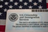 PROMO Miscellaneous - US Citizenship and Immigration Services Card Migrant - iStock - Evgenia Parajanian