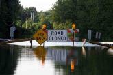 PROMO 64J1 Transportation - Sign Road Closed Flooding High Water Outdoors Road - iStock - djperry