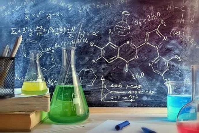 64J Science - Beaker Chemical Formula Books Education - iStock - Davizro Science - Beaker Chemical Formula Books Education - iStock - Davizro
