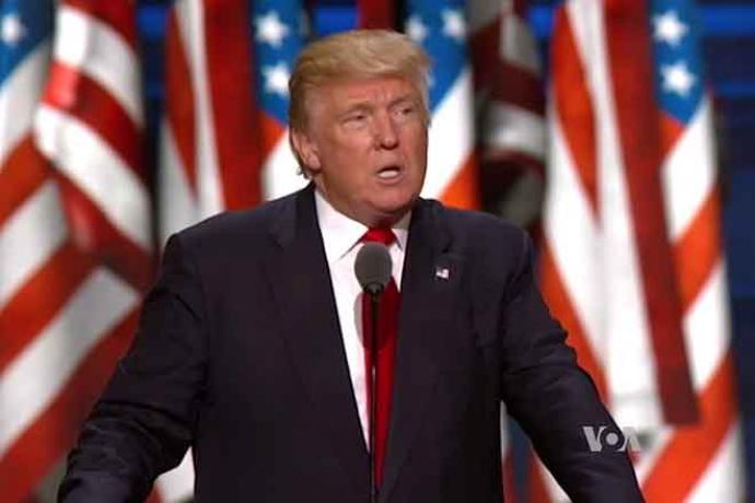 PROMO 64J1 People - Donald Trump United States Flag - Voice of America - public domain PROMO People - Donald Trump United States Flag - Voice of America - public domain