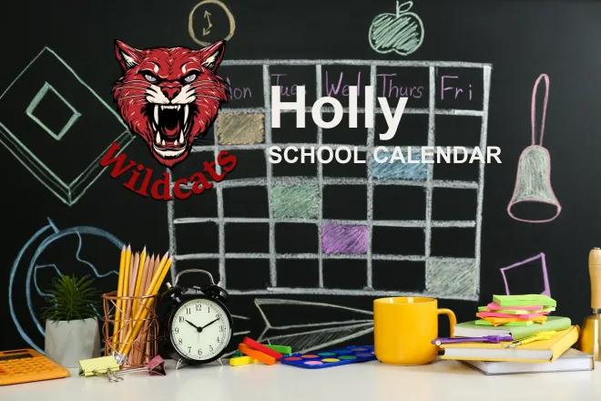 The Holly School Wildcats mascot, beside a chalkboard drawn with a weekly calendar grid above a desk of pencils, a clock and notebooks. The board reads “Holly School Calendar”.