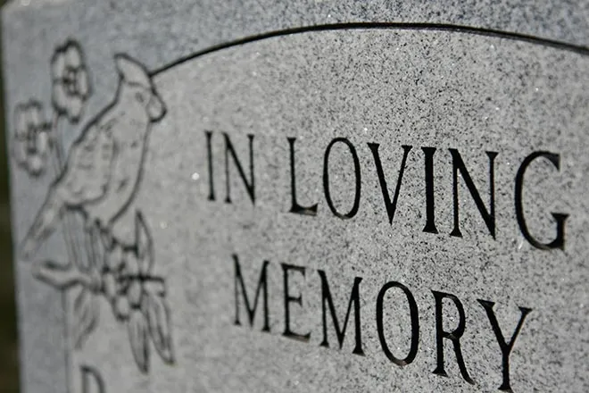 64J Obituary - Grave Marker In Loving Memory - iStock - melissarobison Obituary - Grave Marker In Loving Memory - iStock - melissarobison
