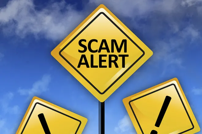 PROMO 660 x 440 Tips - Scam Alert Caution Sign - iStock