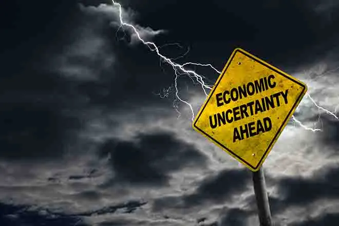 PROMO 64J1 Economy - Sign Economic Uncertainty Ahead Inflation - iStock - ronniechua PROMO Economy - Sign Economic Uncertainty Ahead Inflation - iStock - ronniechua