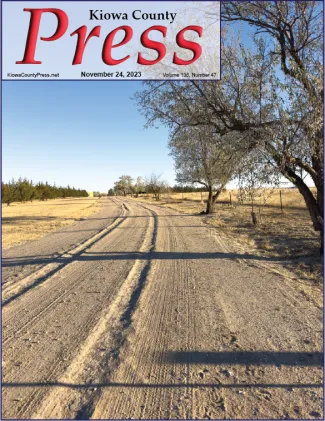 Front cover of the Kiowa County Press from November 24, 2023, showing a gravel road curving into the distance.