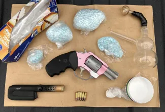 Drugs, drug paraphernalia and handgun