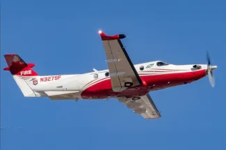 PROMO HIRES Fire - Plane MMA Multi-Mission Aircraft DFPC Colorado Division of Fire Prevention and Control - DFPC Colorado Division of Fire Prevention and Control Multi-Mission Aircraft in flight.