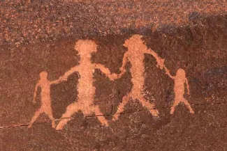 PROMO 64J1 Indigenous - Petroglyph Adults Children - iStock - trekandshoot