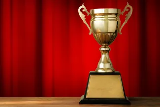 PROMO 660 x 440 Sports - Trohphy Red Curtain - iStock PROMO 660 x 440 Sports - Trohphy Red Curtain - iStock