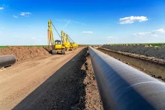 PROMO 64 Energy - Oil Gas Pipeline Construction Machinery Equipment - iStock - RGtimeline