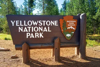PROMO 64 Outdoors - Yellowstone National Park Wyoming Montana NPS Sign - Ingo Dörenberg - iStock-1138192128 PROMO 64 Outdoors - Yellowstone National Park Wyoming Montana NPS Sign - Ingo Dörenberg - iStock-1138192128