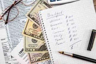 PROMO Finance - Budget Money Tax Forms - iStock - alfexe