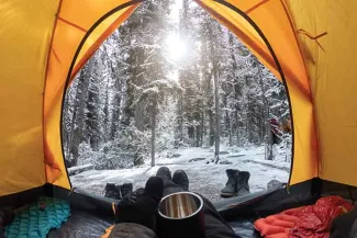 PROMO 64J1 Outdoors - Camping Tent Gear Forest Trees Snow - iStock - Mumemories PROMO Outdoors - Camping Tent Gear Forest Trees Snow - iStock - Mumemories