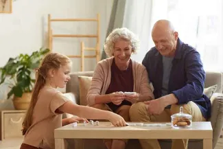 PROMO People - Senior Citizen Family Child Game Home - iStock - SeventyFour