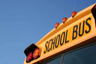 PROMO 64J1 School - Yellow Bus Blue Sky - iStock - aceshot PROMO School - Yellow Bus Blue Sky - iStock - aceshot