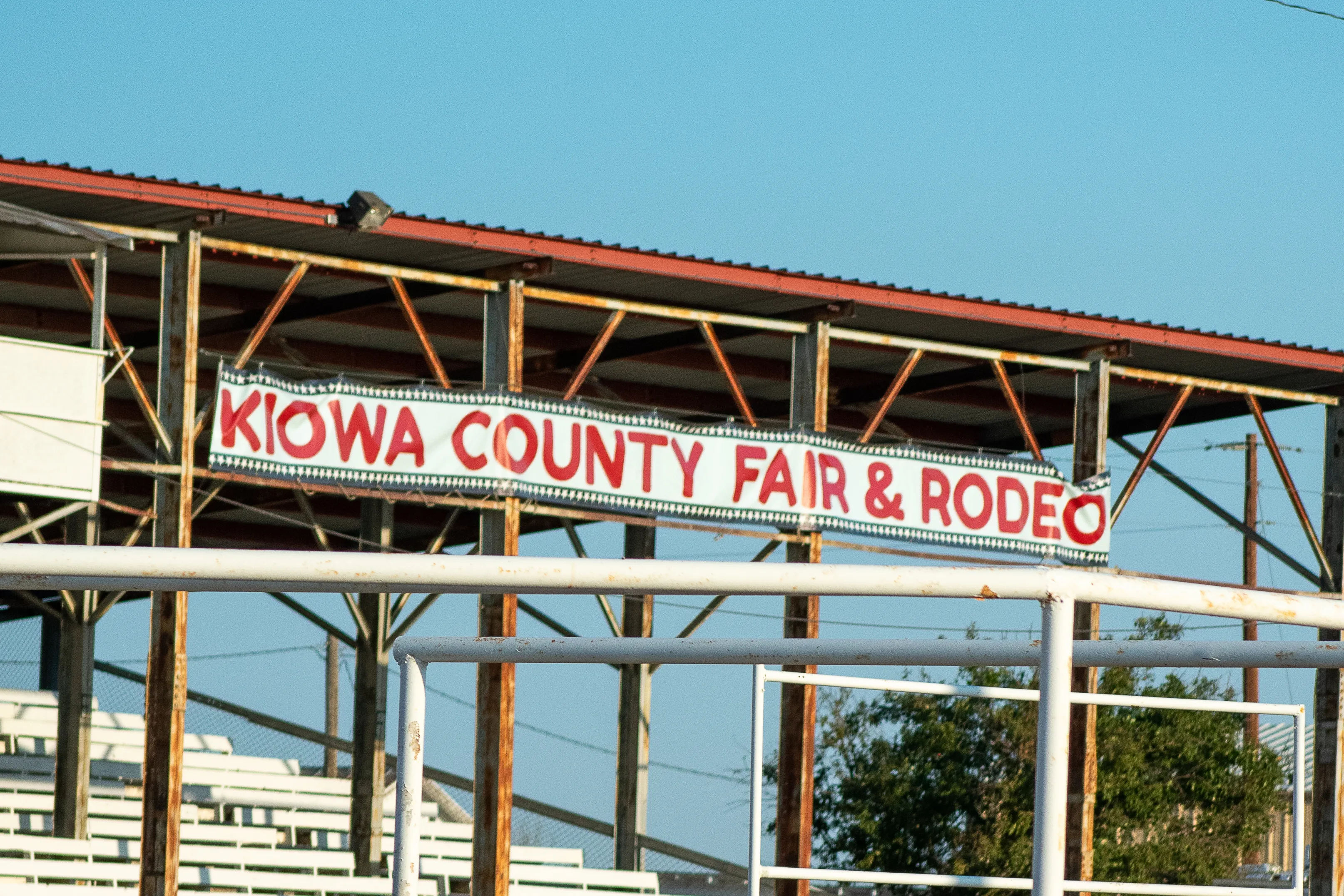 Grandstands at the Kiowa County Fairground with a banner reading "Kiowa County Fair & Rodeo"