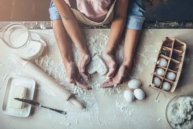 PROMO Food - Cooking Baking Hands Eggs Flour Butter Milk Rolling Pin - iStock - Vasyl Dolmatov