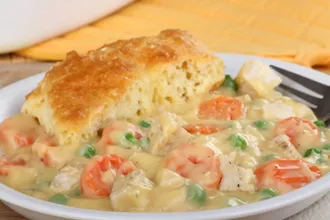 Plate of chicken pot pie on a table.