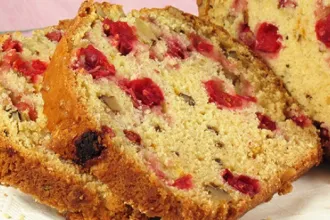 Closeup of slices of cranberry nut bread.